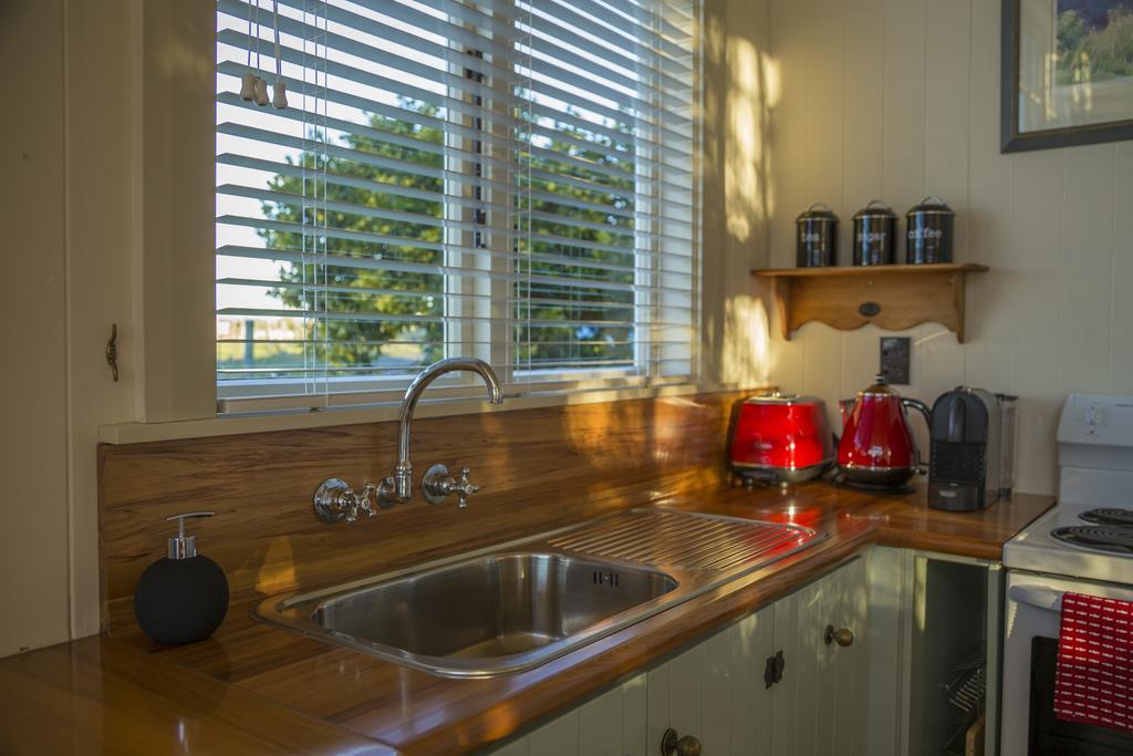 Kina Beach Cottages Tasman Quarto foto